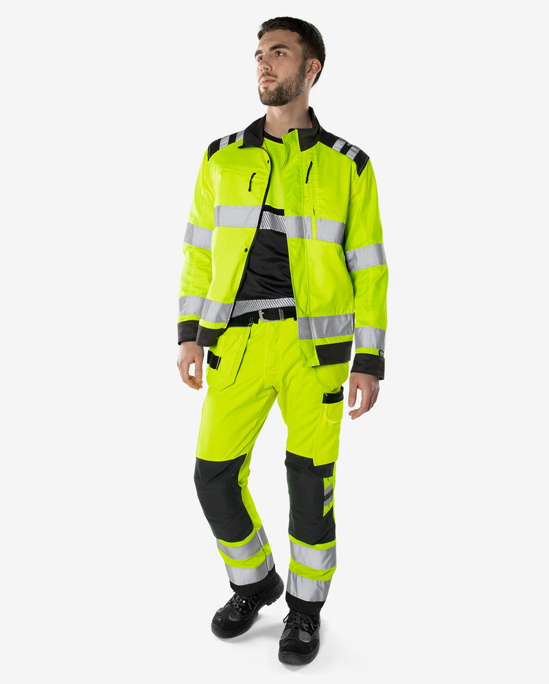 Load image into Gallery viewer, Trousers FRISTADS HIGH VIS GREEN CRAFTSMAN TROUSERS CLASS 2 2641 GPLU
